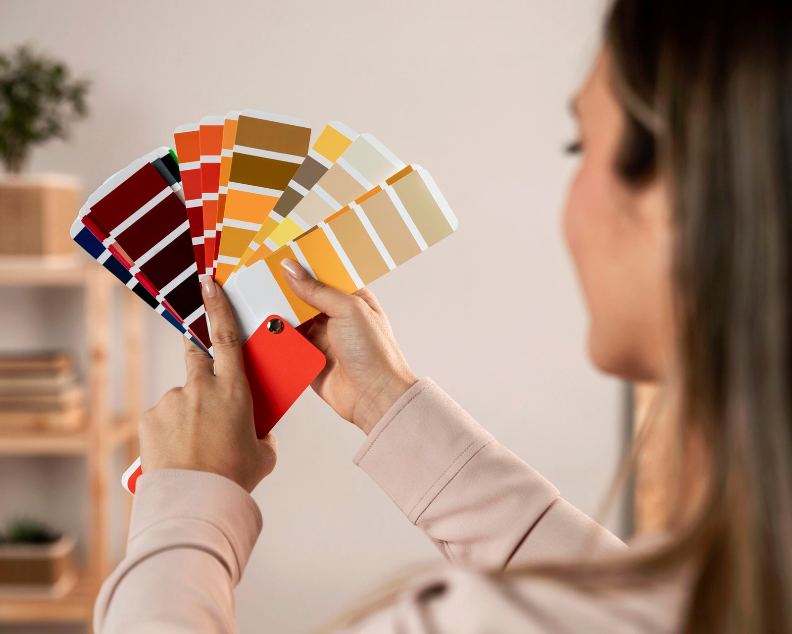 Close up woman holding color palette.