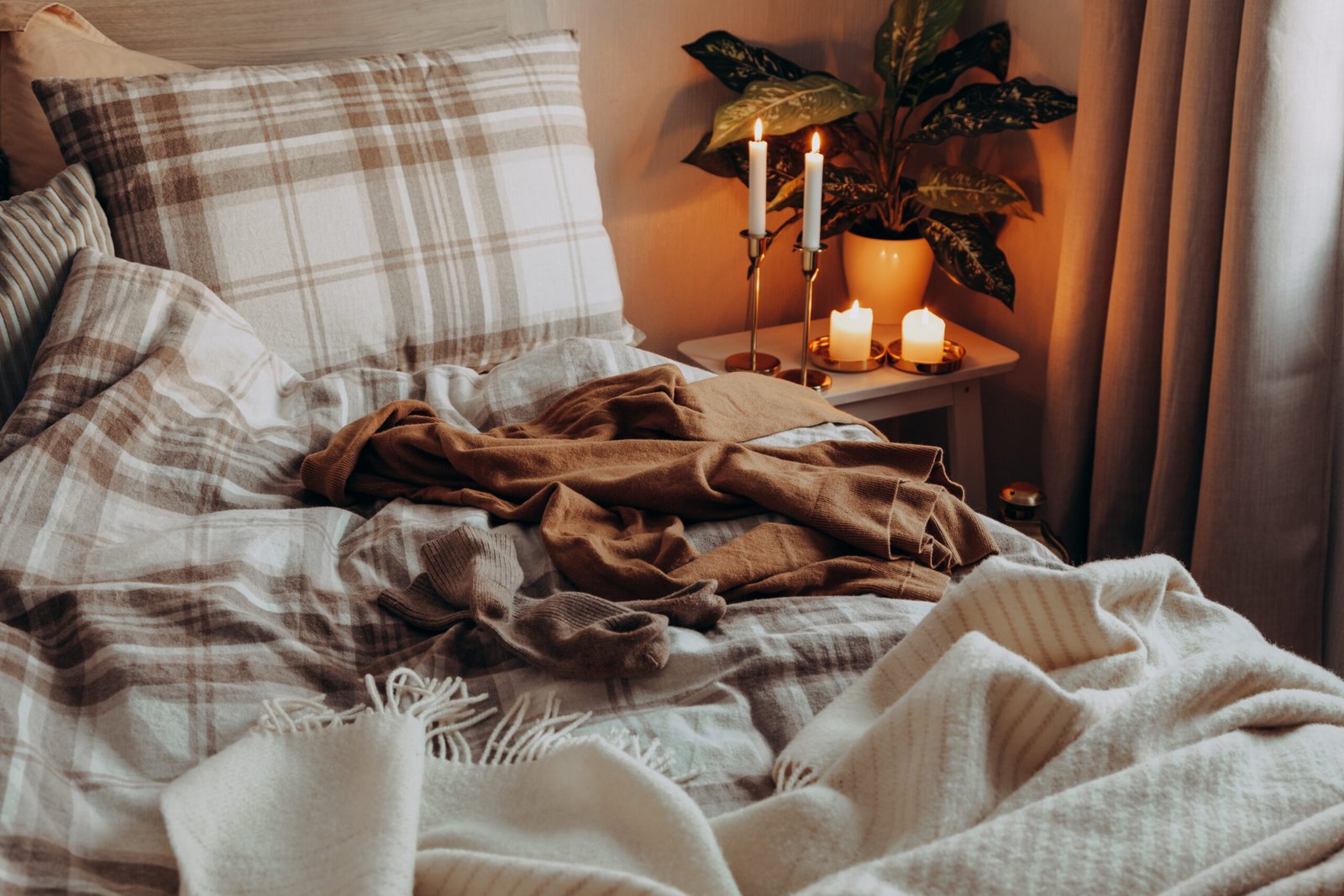 Cozy Scandinavian bedroom interior in natural tones.
