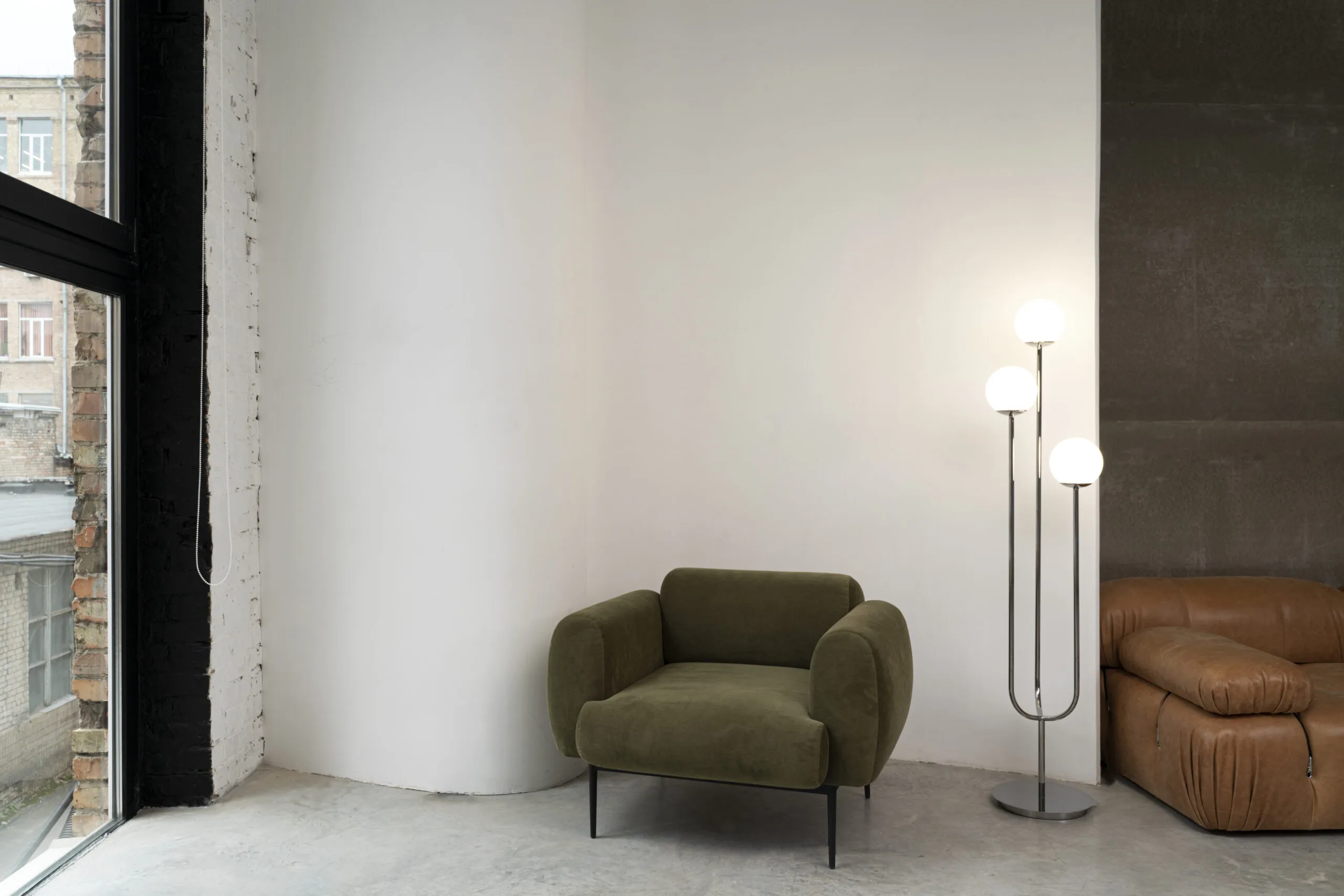 Empty modern room with an armchair.