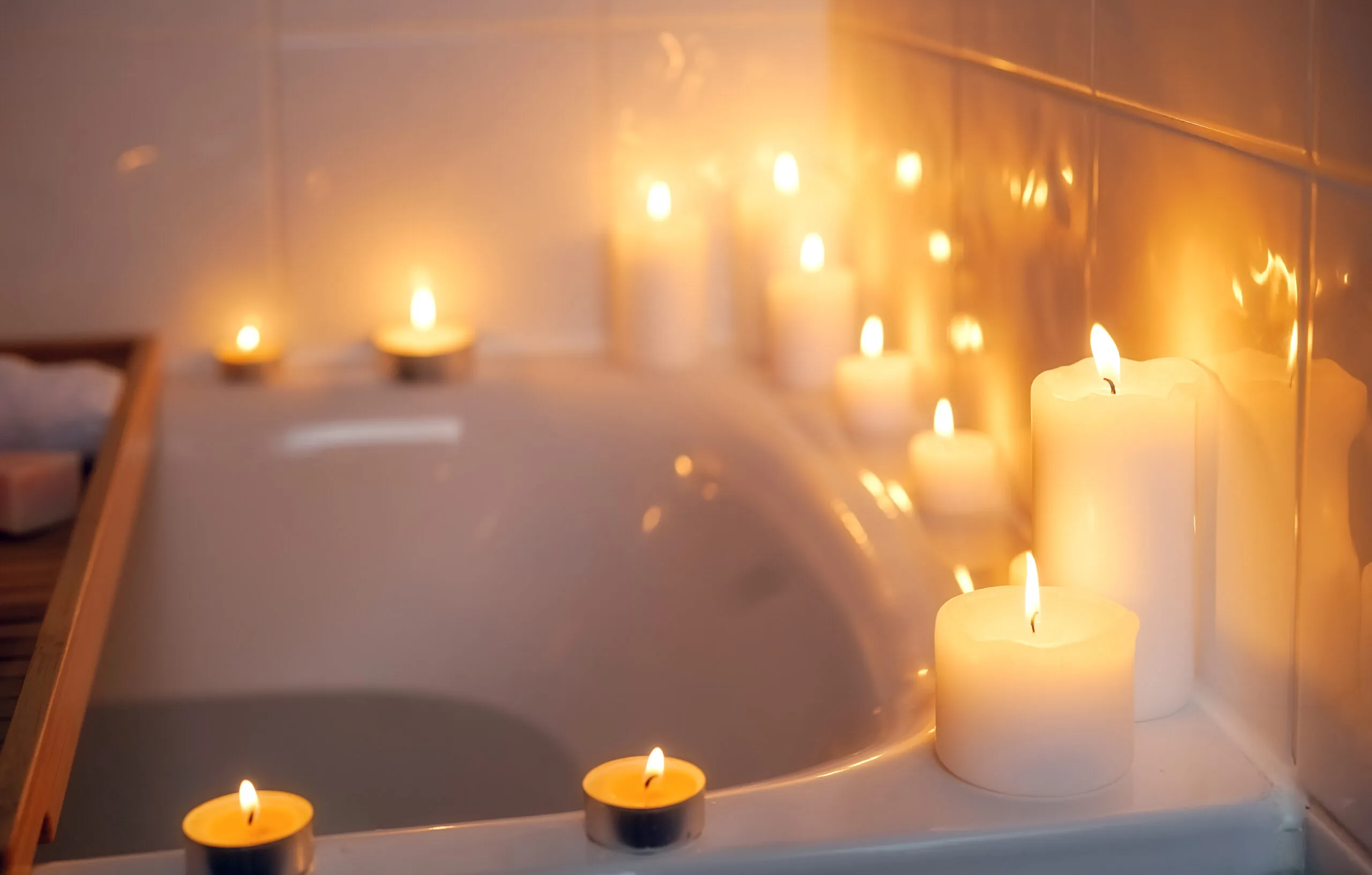 Spiritual aura cleansing ritual bath for full moon ritual with candles and aroma salt.