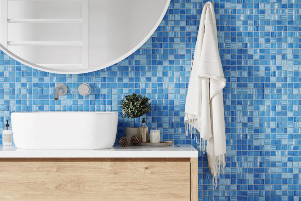 Coastal bathroom with blue & white tiles.