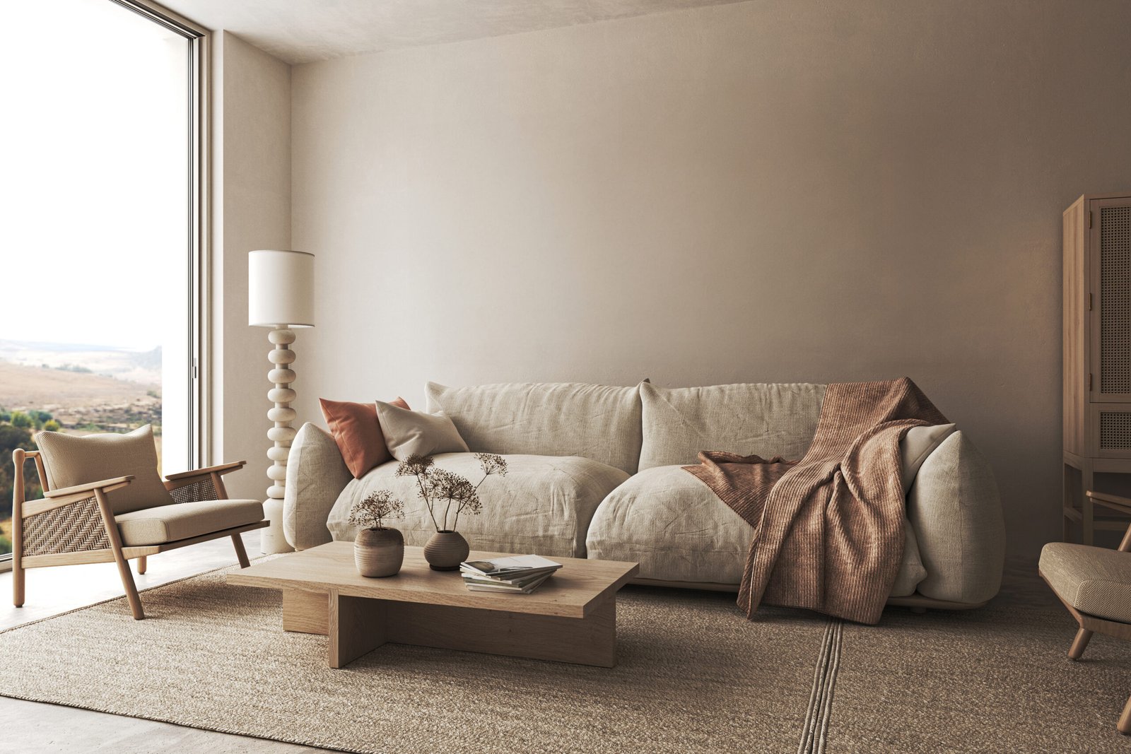 Boho beige livingroom with dry plant in vase background.