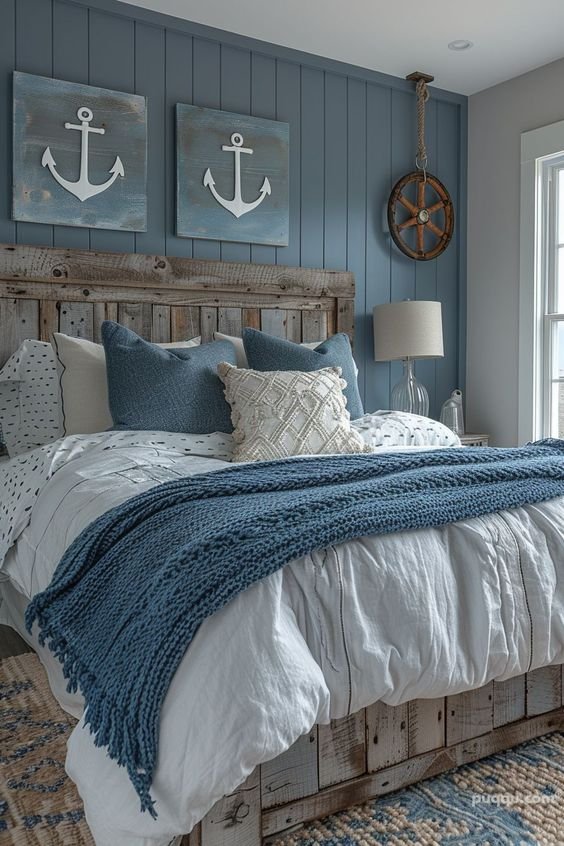 Coastal bedroom with deep blue accents and nautical elements.