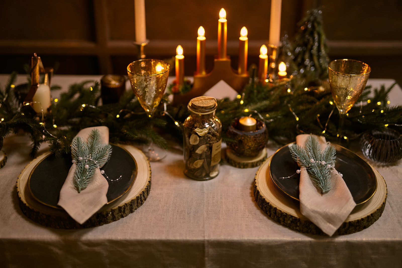 Beautiful, decorated table with flower decorations and candles.