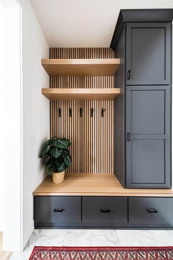 Minimalist grey and wooden mud room ideas. 