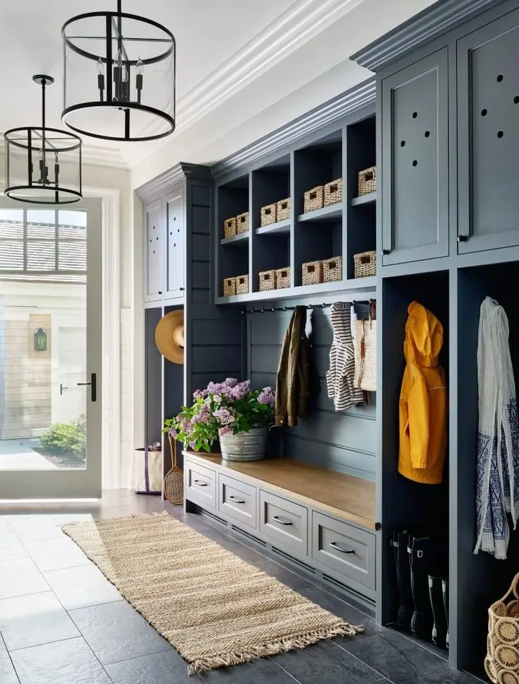 Blue mudroom with built in storage.