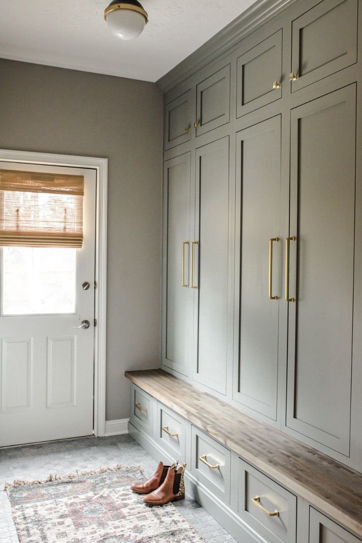 Beautiful green storage solution for mud room. 