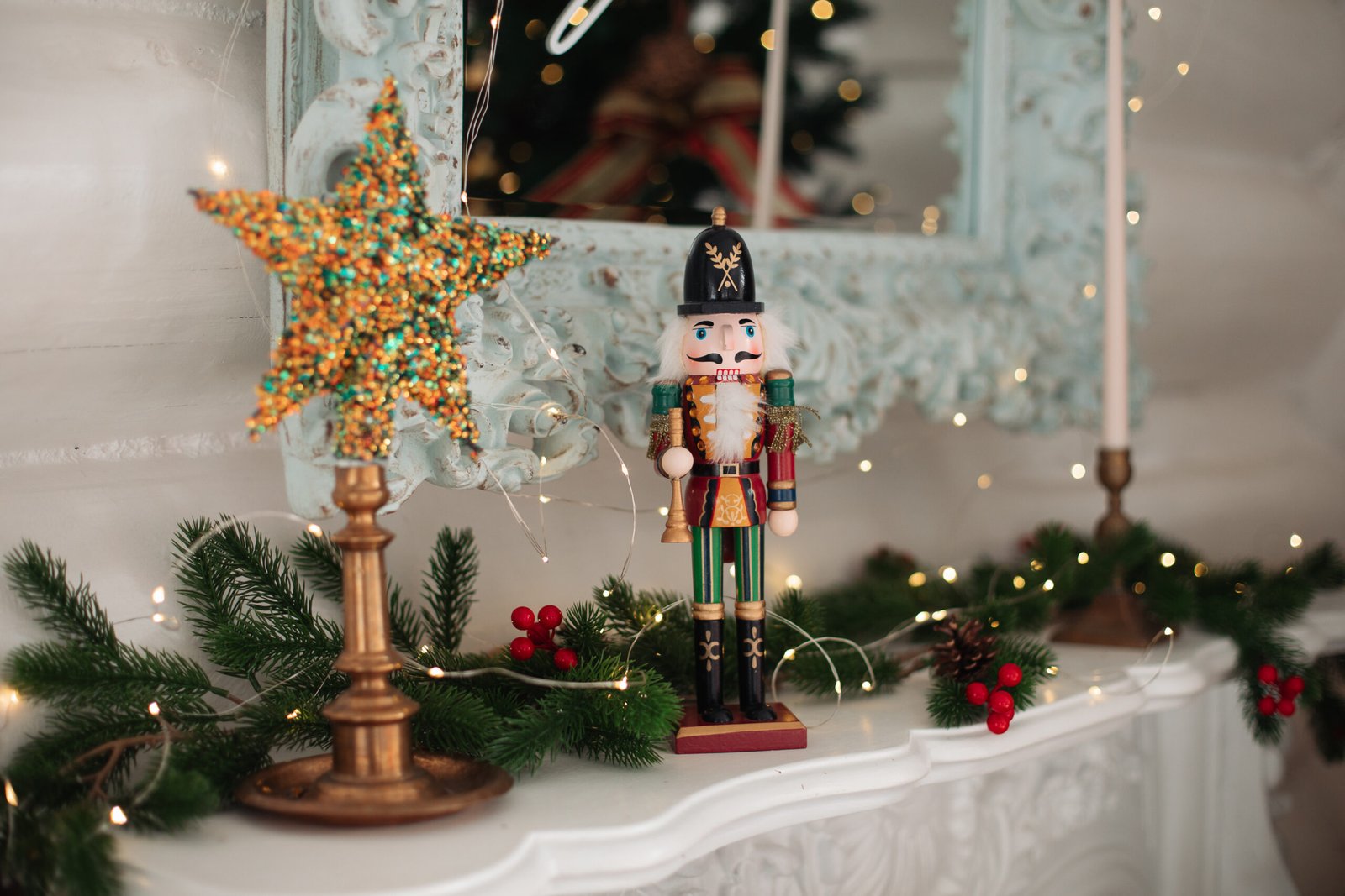 Beautiful Christmas decor. Decorating a room on a holiday. Stylish details with a nutcracker.