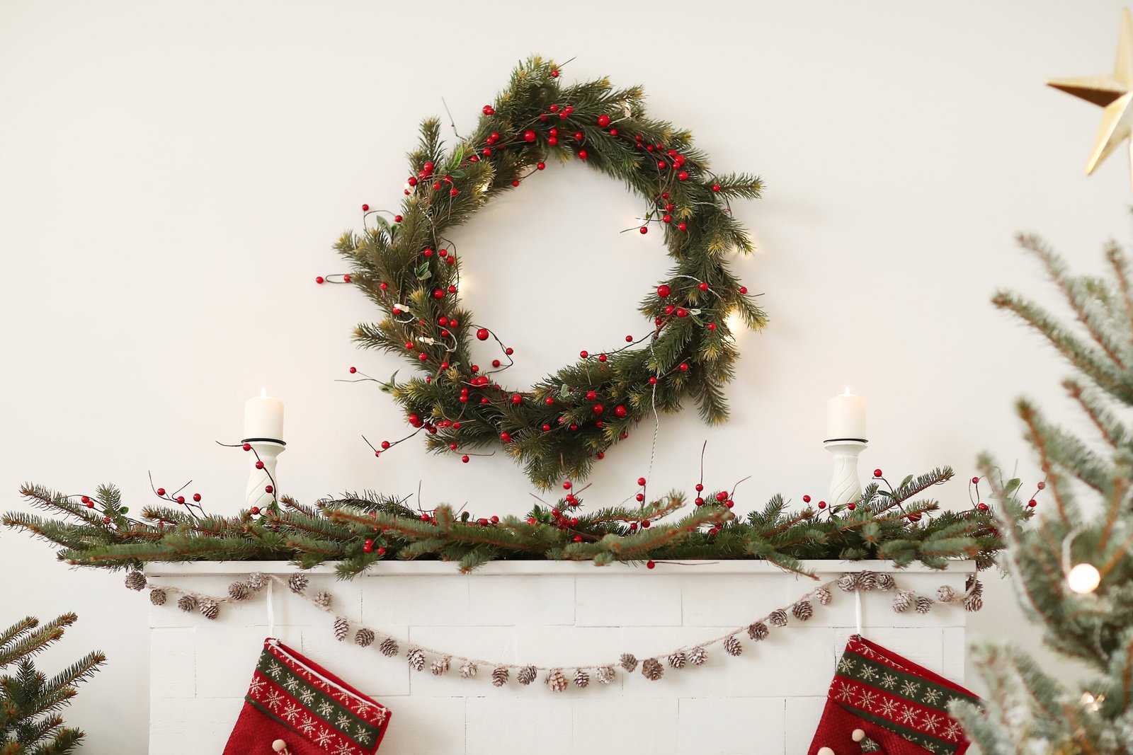 Christmas mantle decorated with traditional christmas decor. 