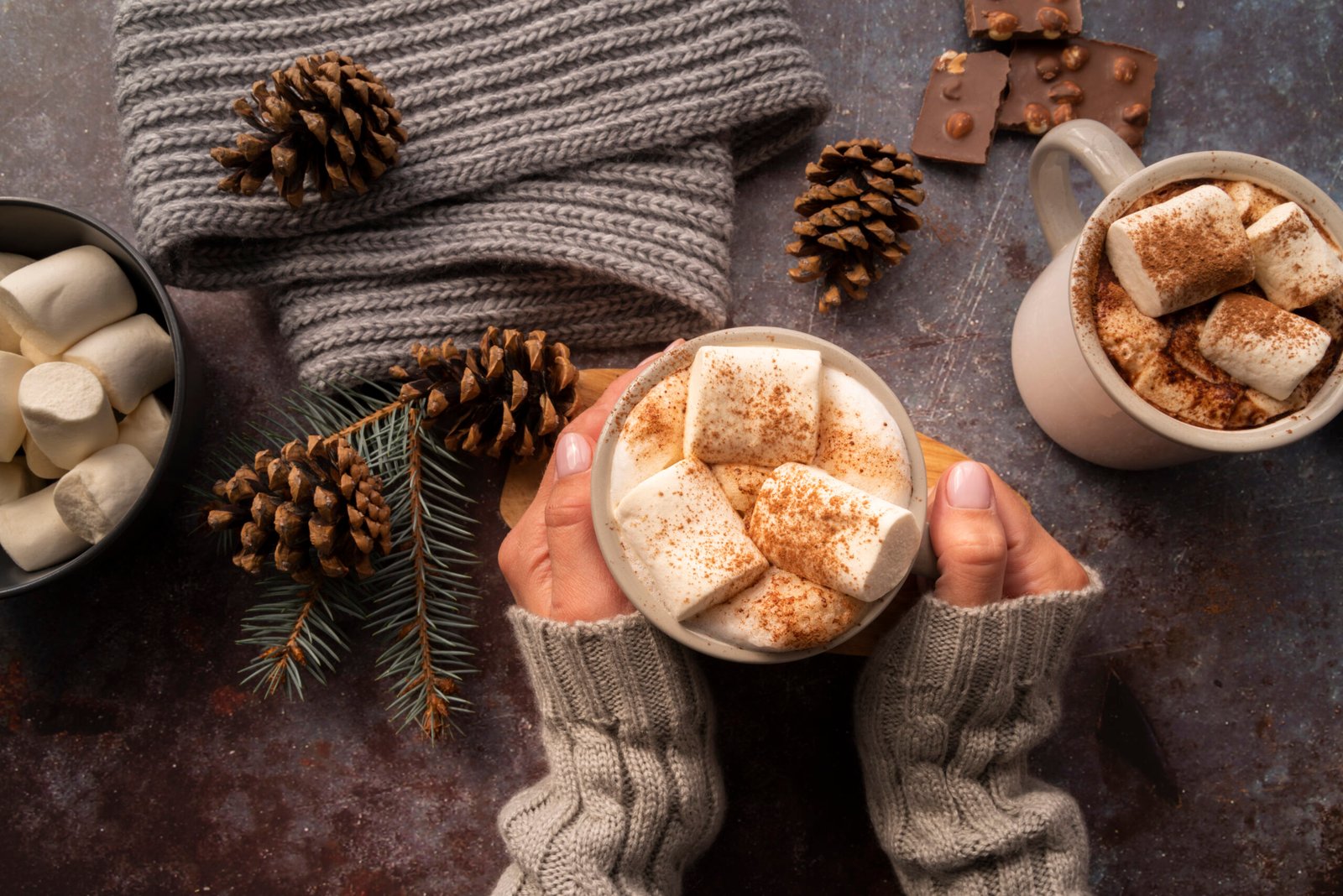 Closeup woman with sweater and a delicious hot chocolate. 