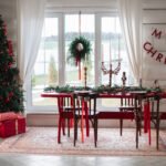 Beautiful Christmas interior. A table and a Christmas tree, a festive table. decoration.