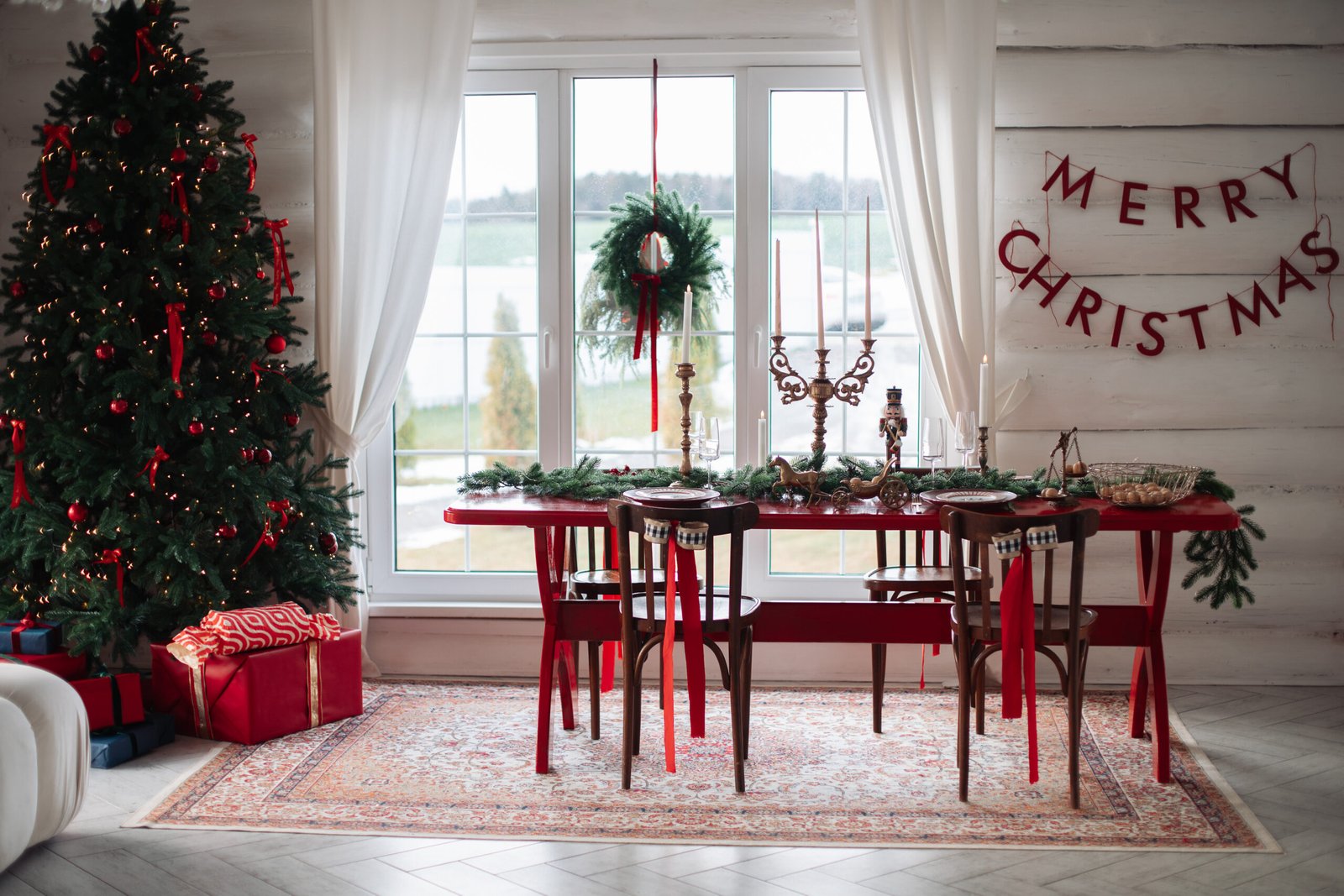 Beautiful Christmas interior. A table and a Christmas tree, a festive table. decoration.