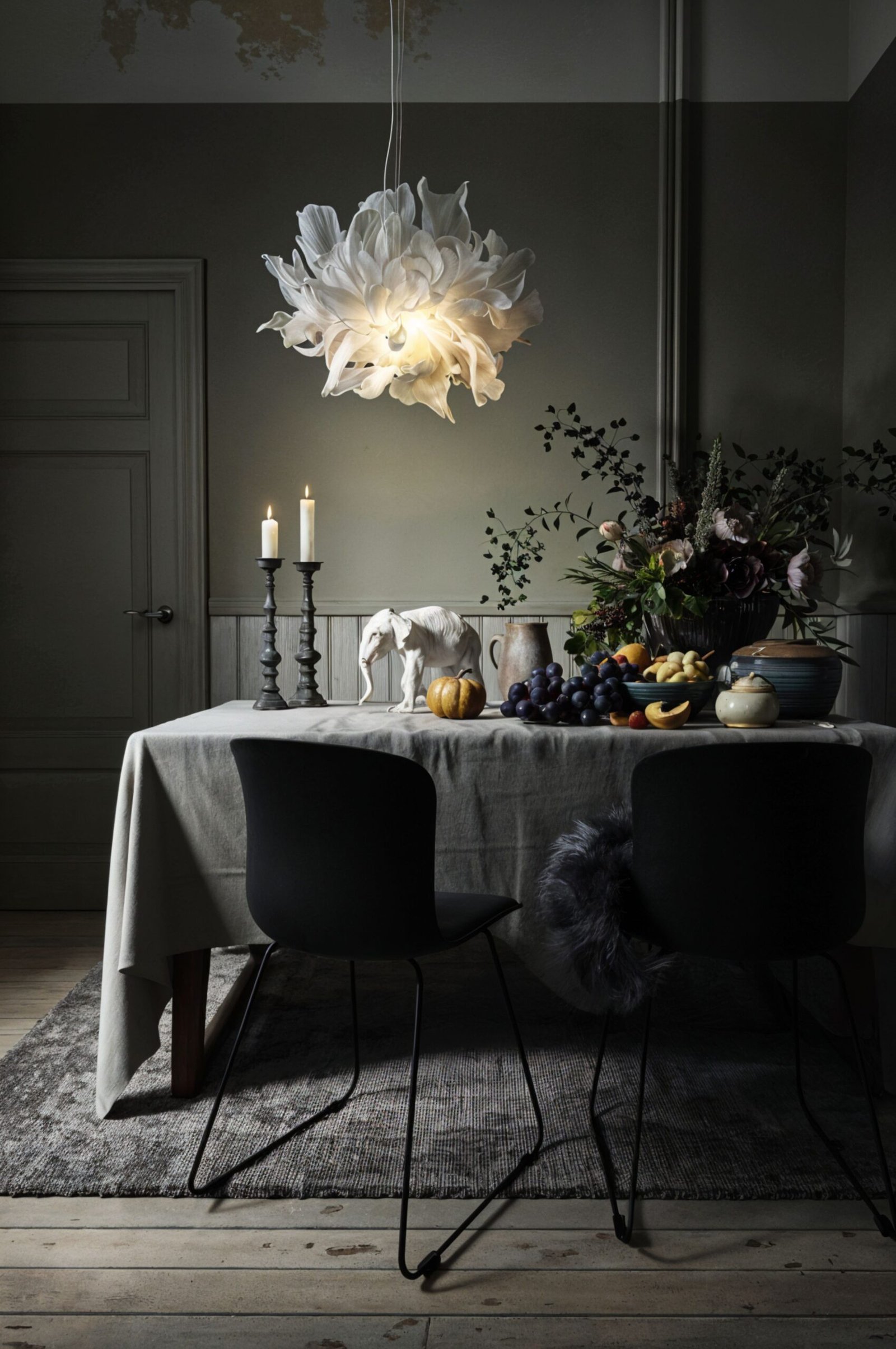 Breathtaking interior in luxurious dining room with a big bold statement lighting. 