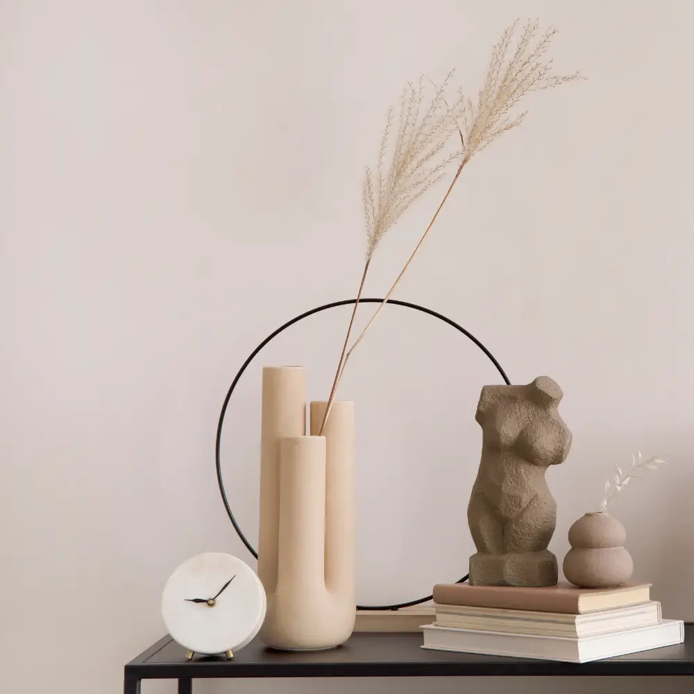 A side table with home decorations on it. 