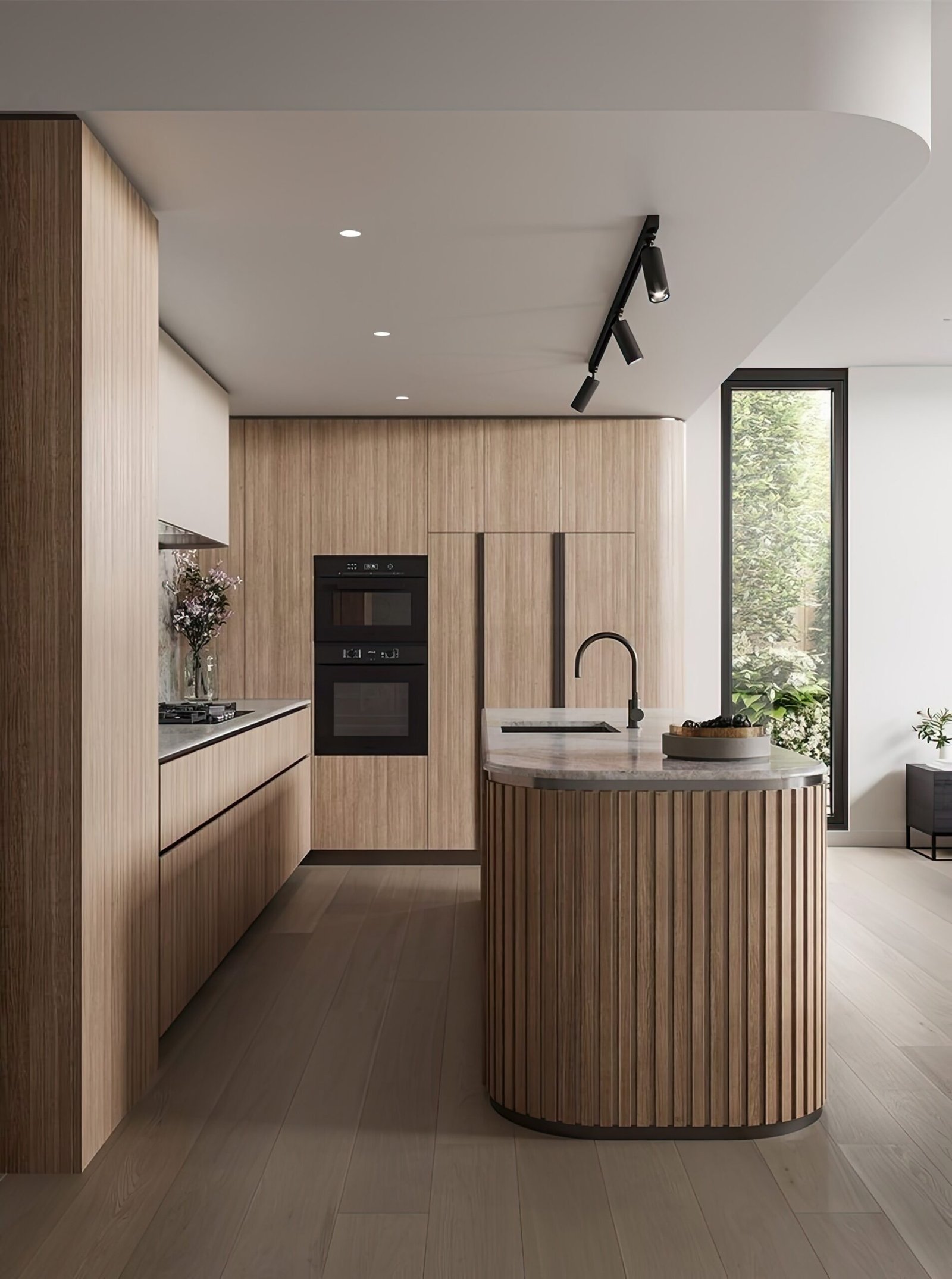 Wooden japandi kitchen with a large kitchen island. Black spots in the ceiling and a black oven. 