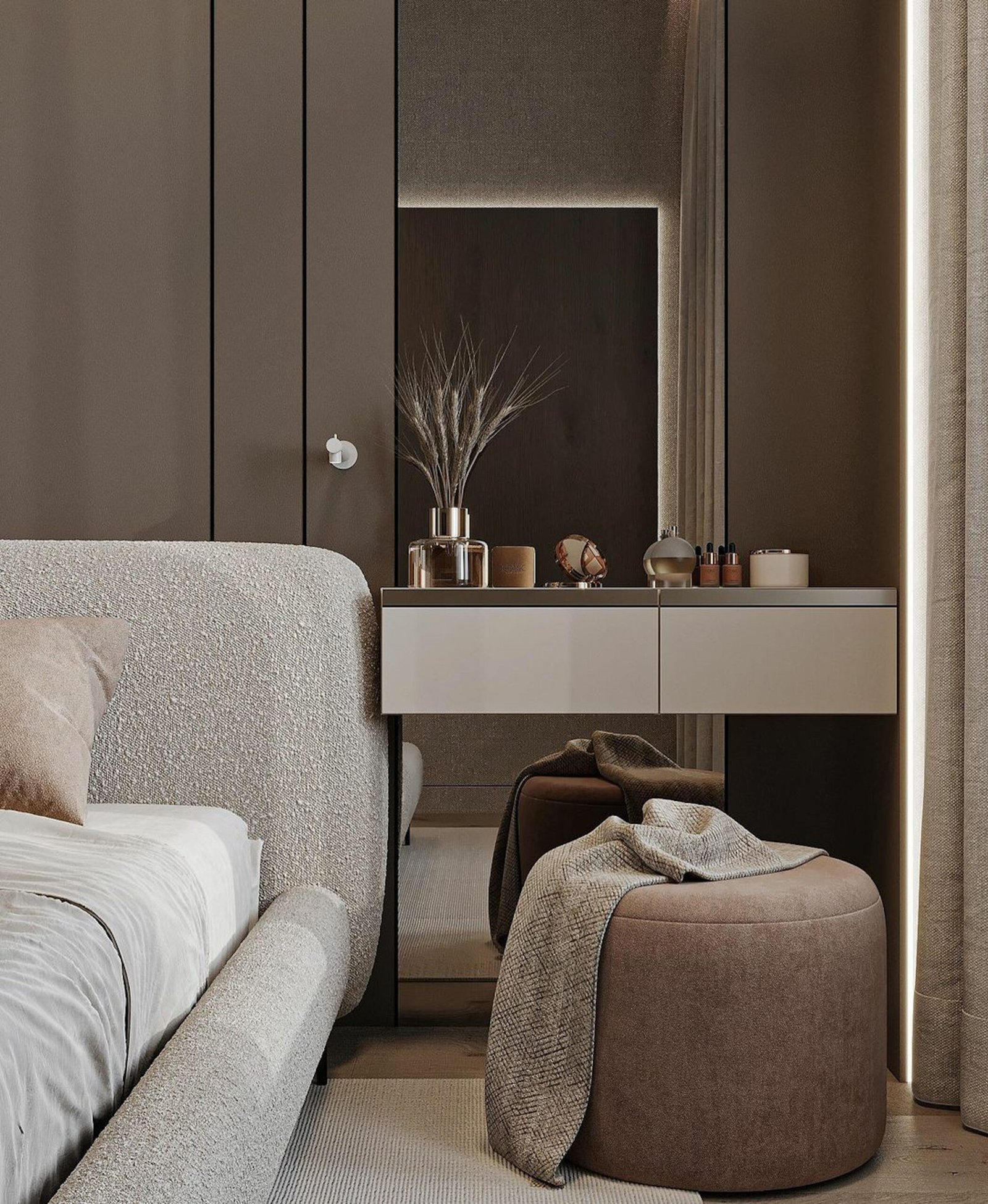 Bedroom with different textures, a puff, a large bed and a desk with a mirror behind it.