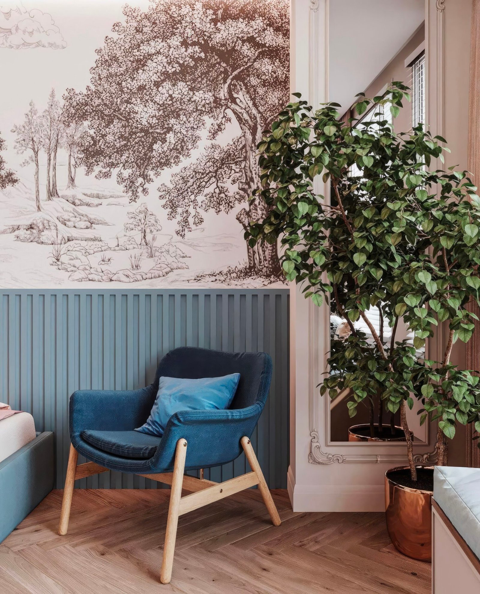 Room with blue panels, a blue armchair and a large plant. Wooden floors. 