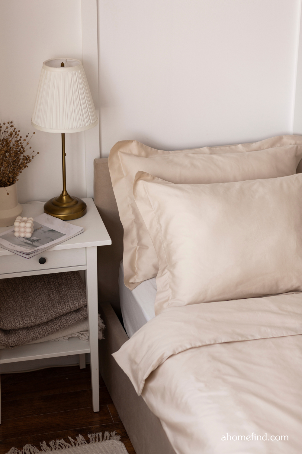 Perfect bed sheets in beige color in a neutral colored bedroom. 