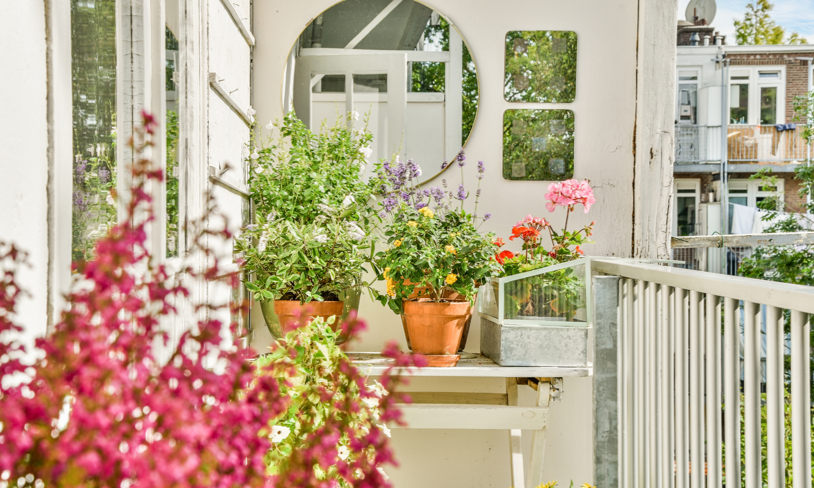 Pastel color porch decor and Outdoor seating ideas for spring with Floral front porch arrangements.