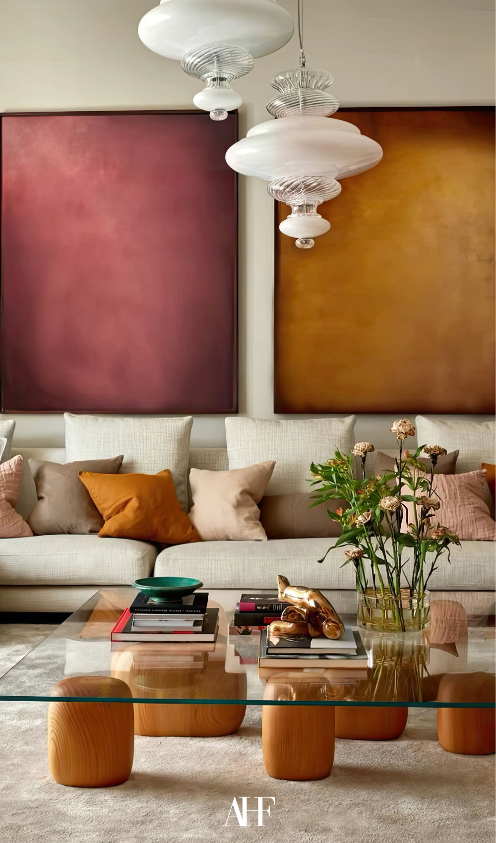 A living room with colors and a round glass table. Summer Interior Design Trends.