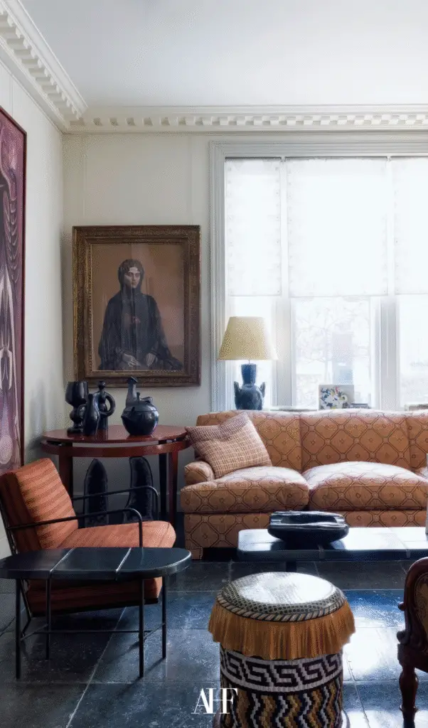 An eclectic living room with a brown sofa and eclectic decorations.