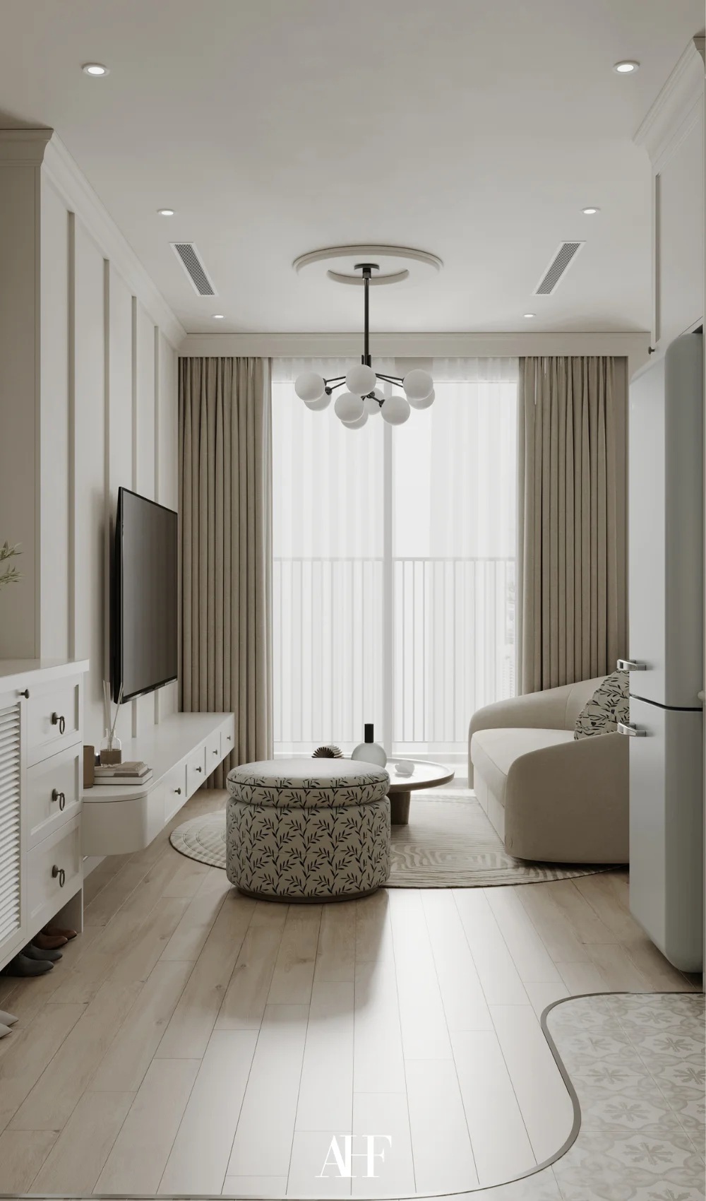 a neutral small apartment living room with a white sofa, neutral wooden floor and neutral colored curtains.