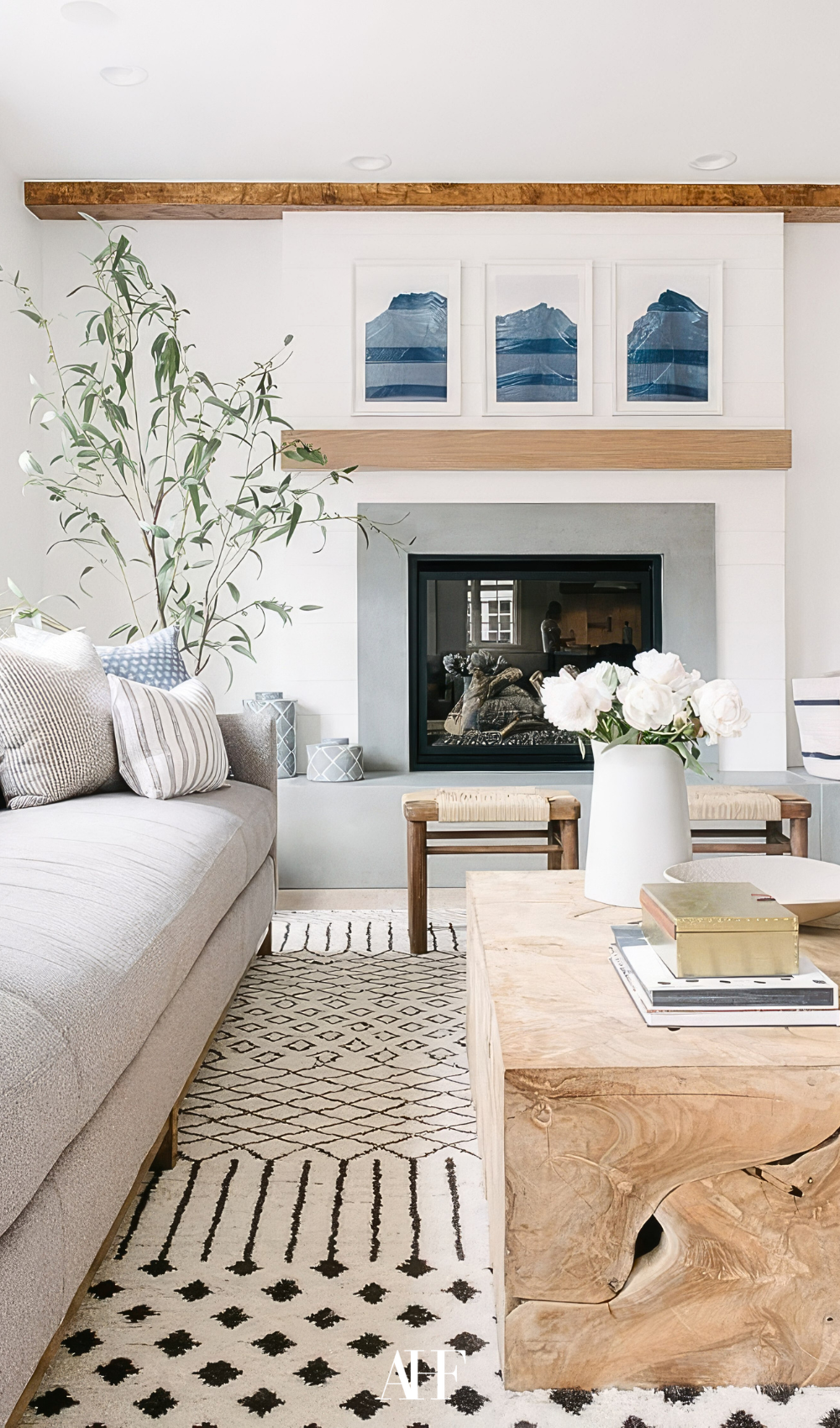 A beautiful coastal living room with nautical living room decor. how to decorate a coastal living room with coastal living room decor.
