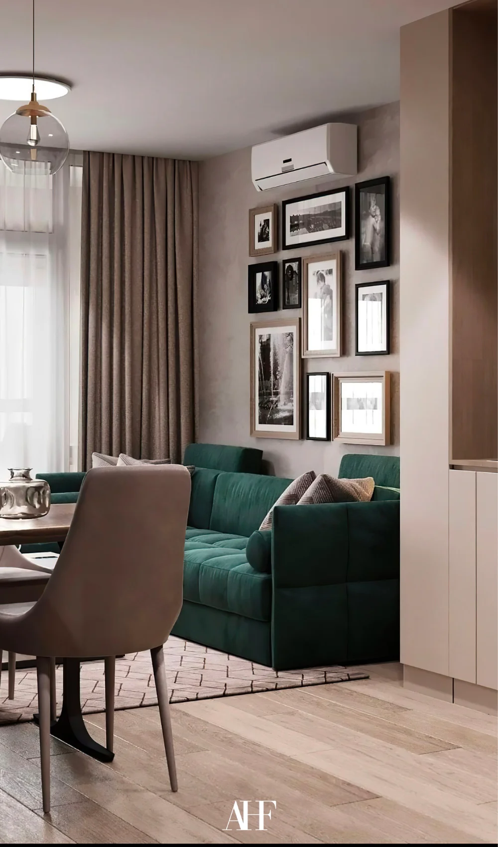 Small apartment living room with a dark green velvet sofa, brown walls and dining chairs. Curtains in front of large window.