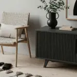 How to decorate your home - part 2. A scandinavian corner with a black wooden side table and a wooden armchair.