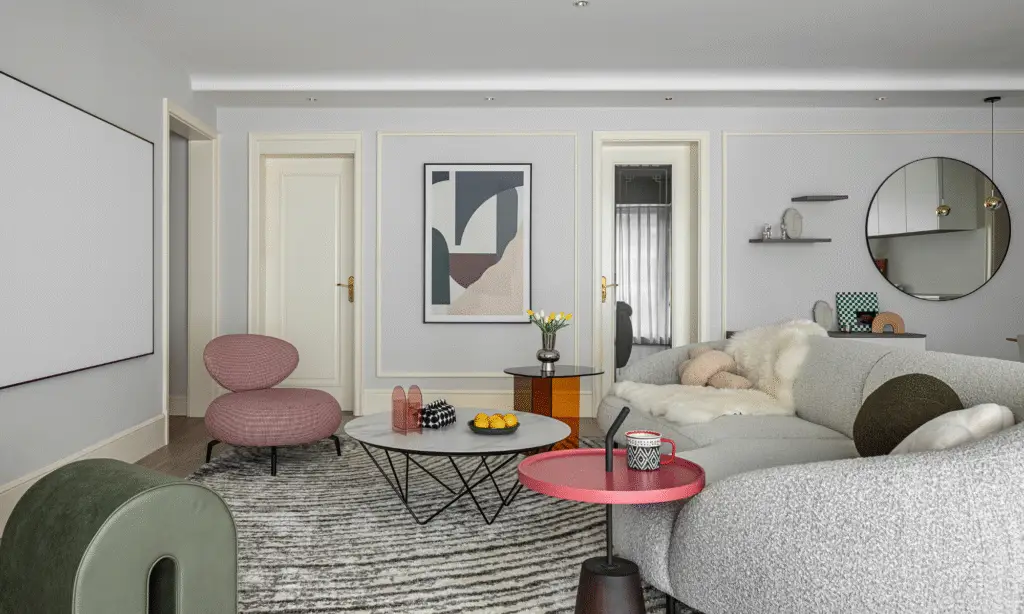 How to decorate your home, a colorful living room with a pink armchair and a light grey sofa. Colorful details and decorations.