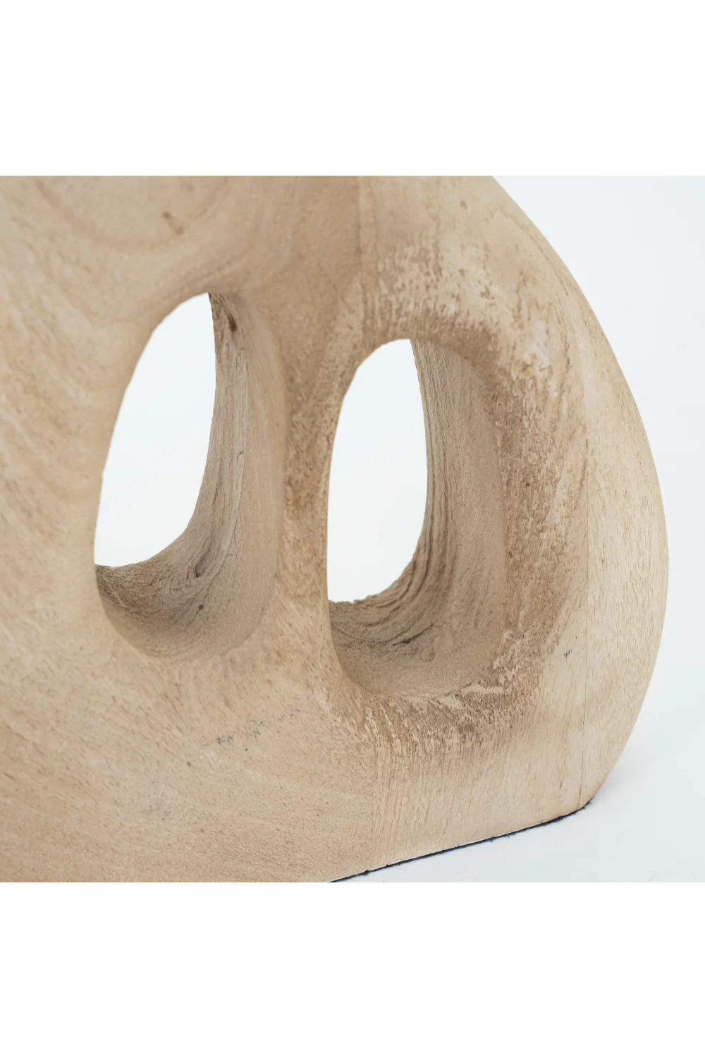 An organic shaped wooden table lamp in Japandi style.