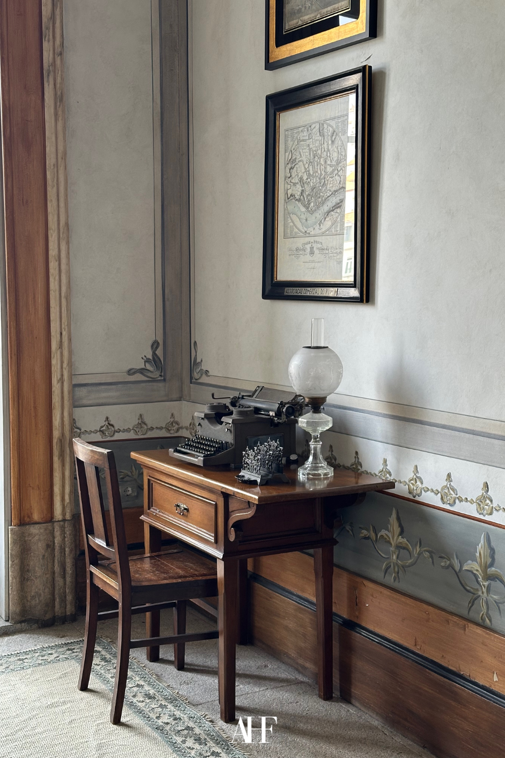 Beautiful vintage modern interior design. with a dark wooden desk and vintage walls.