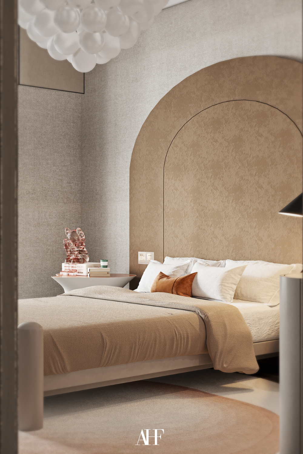 A japandi style bedroom with an arched detail on the wall and a bed with white and beige bedding A large rug and some japandi bedroom decor.