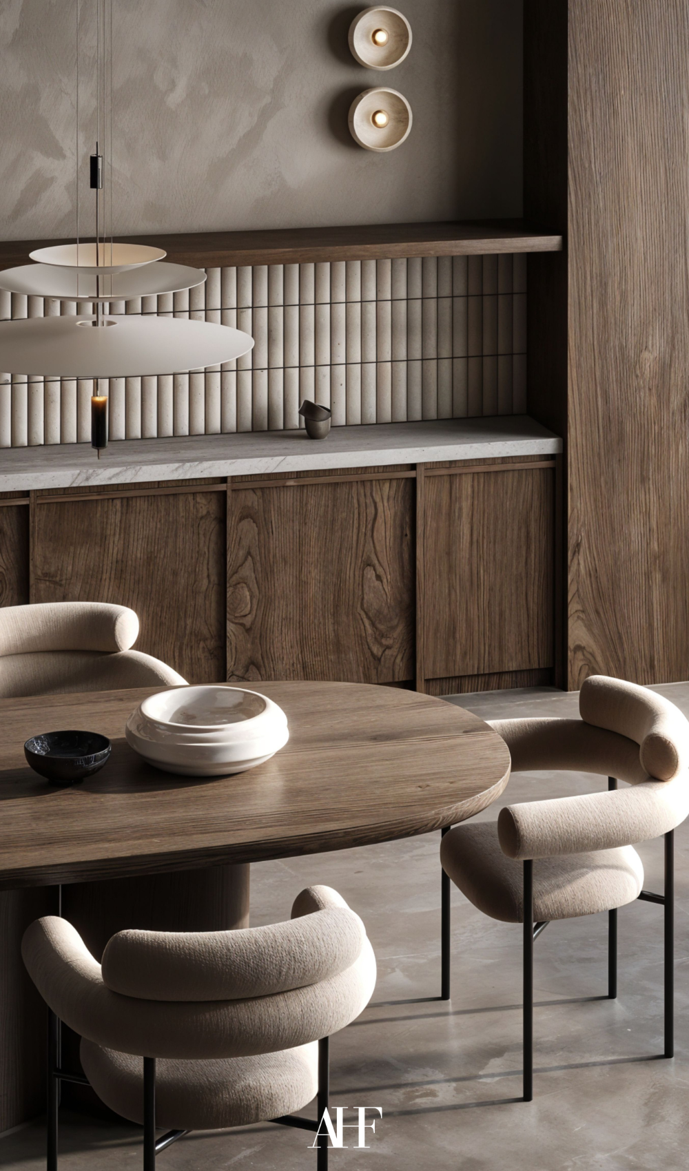 A walnut Japandi kitchen with a walnut table and beige kitchen chairs in the middle. 