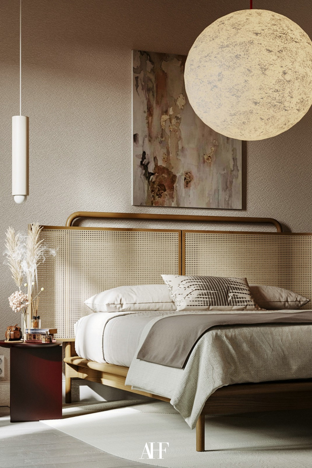 Wooden and rattan bed frame with a wall art above the bed, a wooden bedside table and a bedside table lamp. Japandi bedroom ideas. 