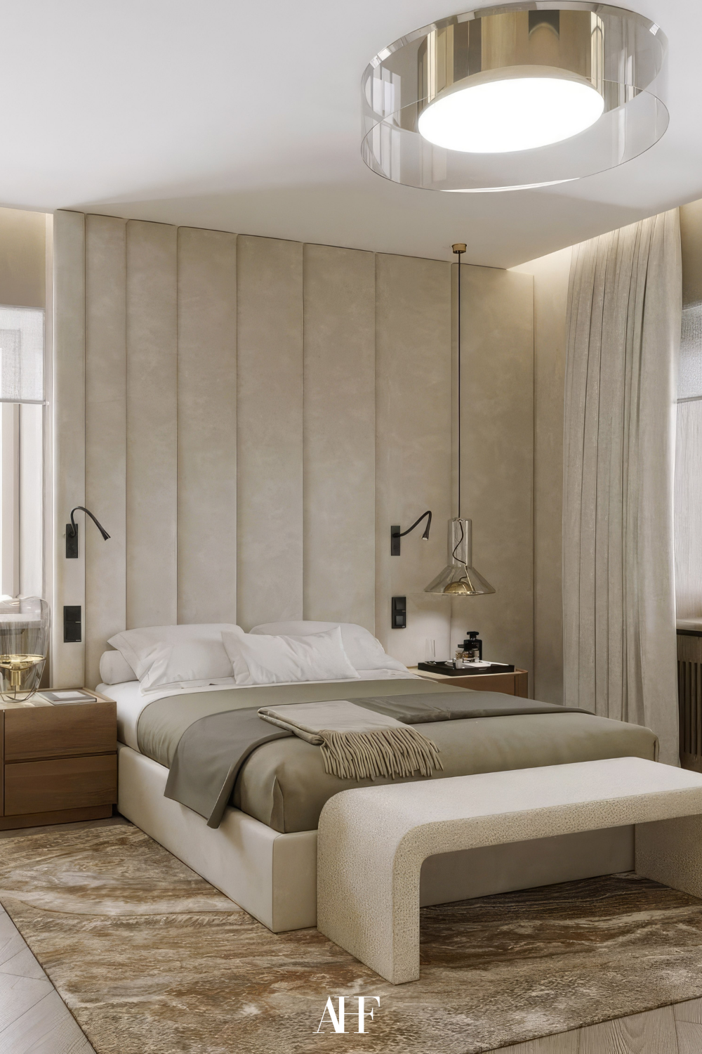 Modern Japandi bedroom with beige bed and a beige bench at the bottom of the bed. Large beige wall and wooden bedside tables.