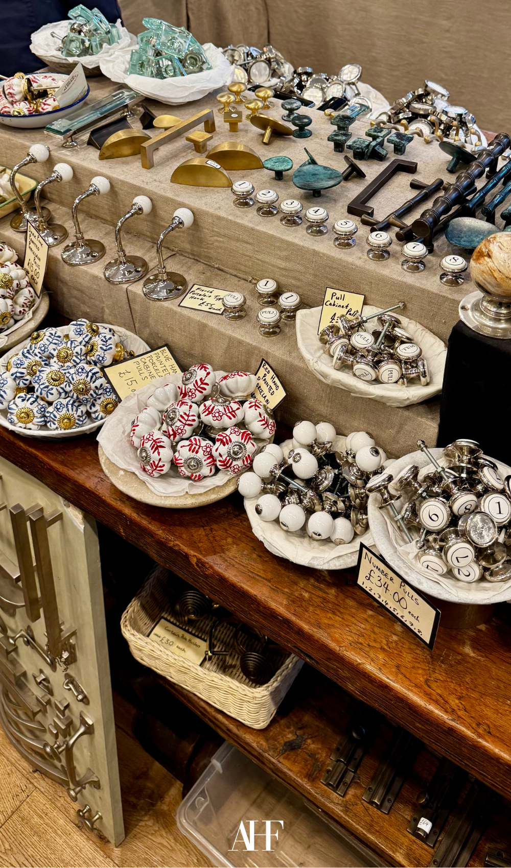 Lots of different doorknobs in various colors in a boutique in London. 
